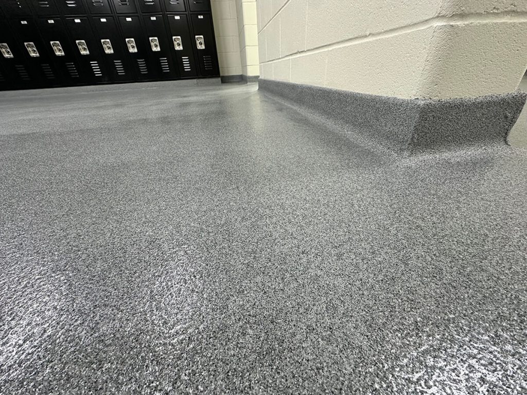 Polyaspartic flake & epoxy flooring solutions by Roder Epoxy in Washington, IA.