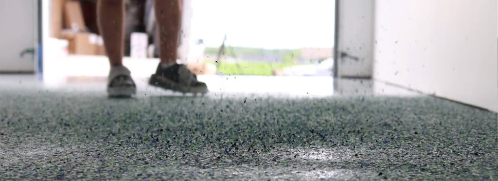 Polyaspartic flake & epoxy flooring solutions by Roder Epoxy in Washington, IA.