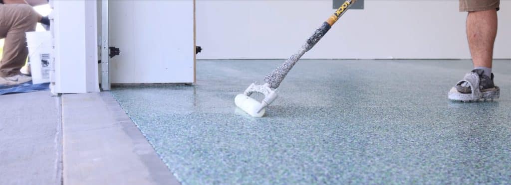 Polyaspartic flake & epoxy flooring solutions by Roder Epoxy in Washington, IA.