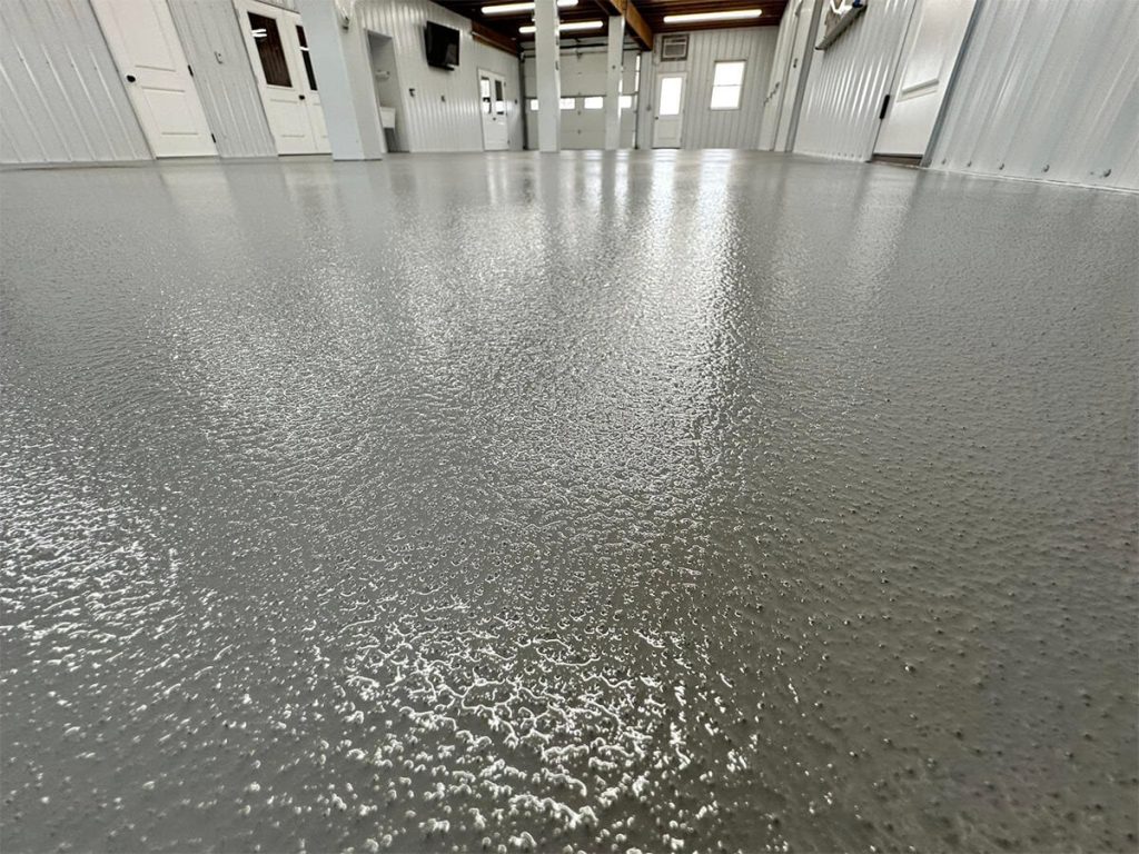 Polyaspartic flake & epoxy flooring solutions by Roder Epoxy in Washington, IA.