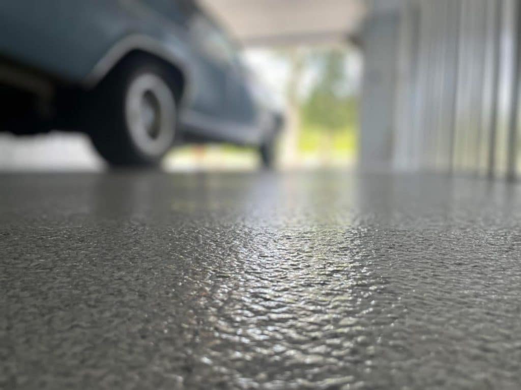 car parked on garage floor